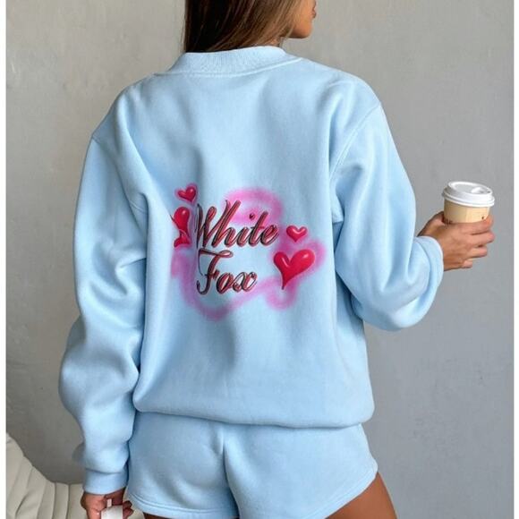 White Fox Boutique Tops - White Fox baby blue size M/L Crewneck sweatshirt NWT